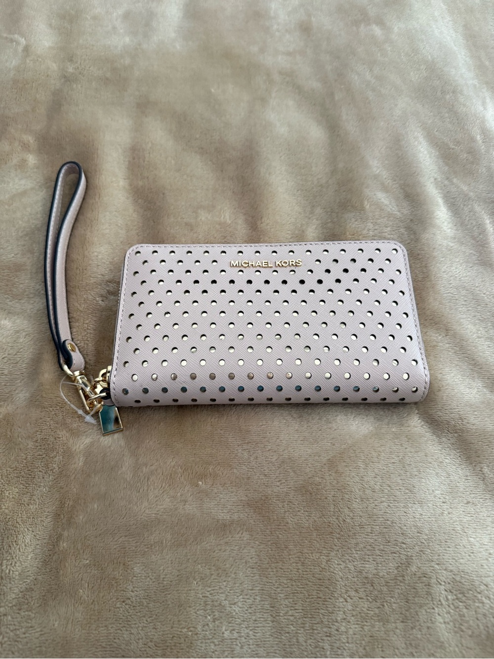 Michael Kors Perforated Wristlet in Pale Pink with Gold Hardware